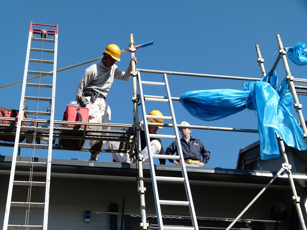 Installation team working on a rooftop solar system